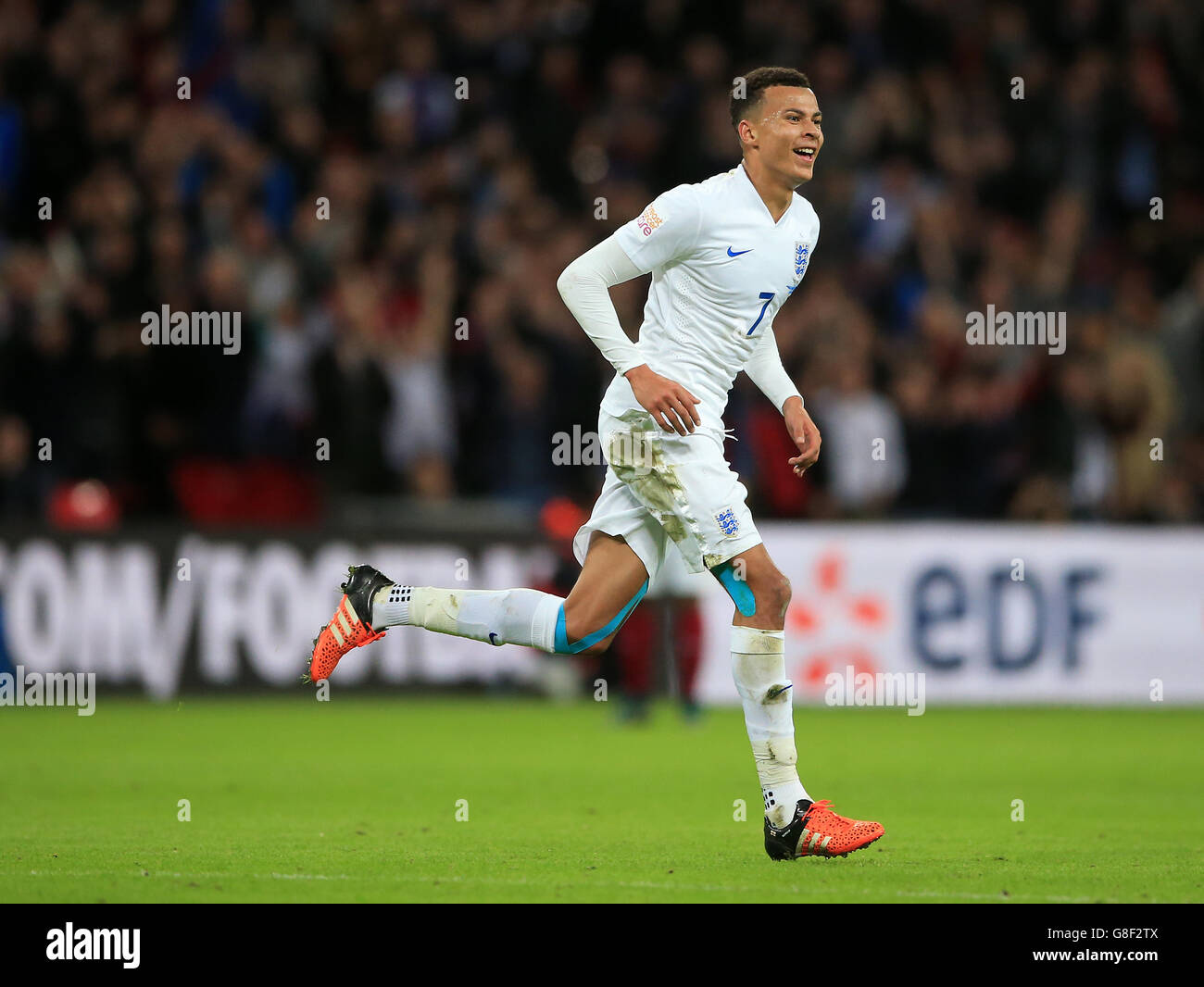 England's Dele Alli celebrates scoring his side's first goal during the