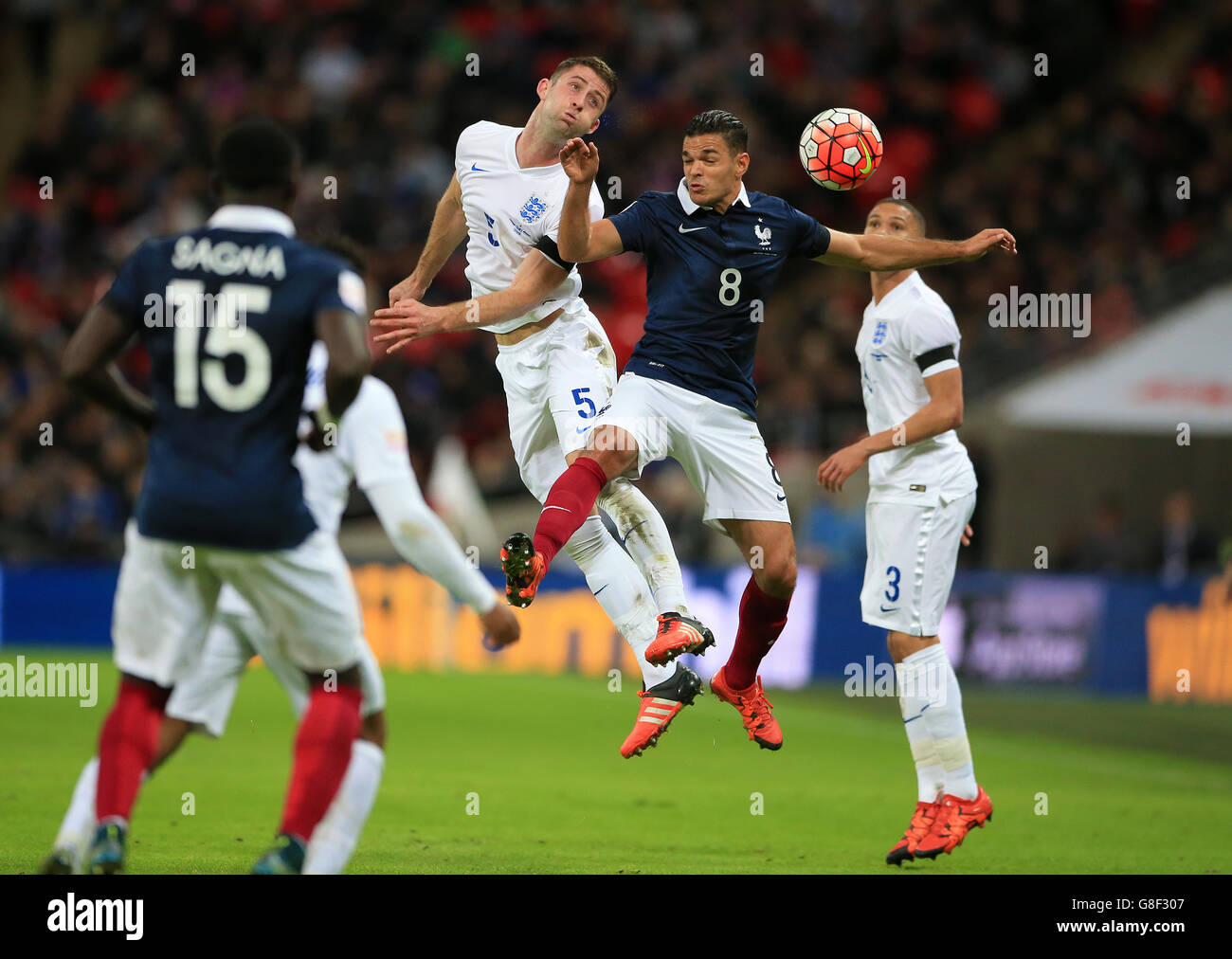 England's Gary Cahill (left) and France's Hatem Ben Arfa battle for the ball during the international friendly match at Wembley Stadium, London. PRESS ASSOCIATION Photo. Picture date: Tuesday November 17, 2015. See PA story SOCCER England. Photo credit should read: Nick Potts/PA Wire. No editing except cropping. Call +44 (0)1158 447447 or see paphotos.com/info for full restrictions and further information. Stock Photo