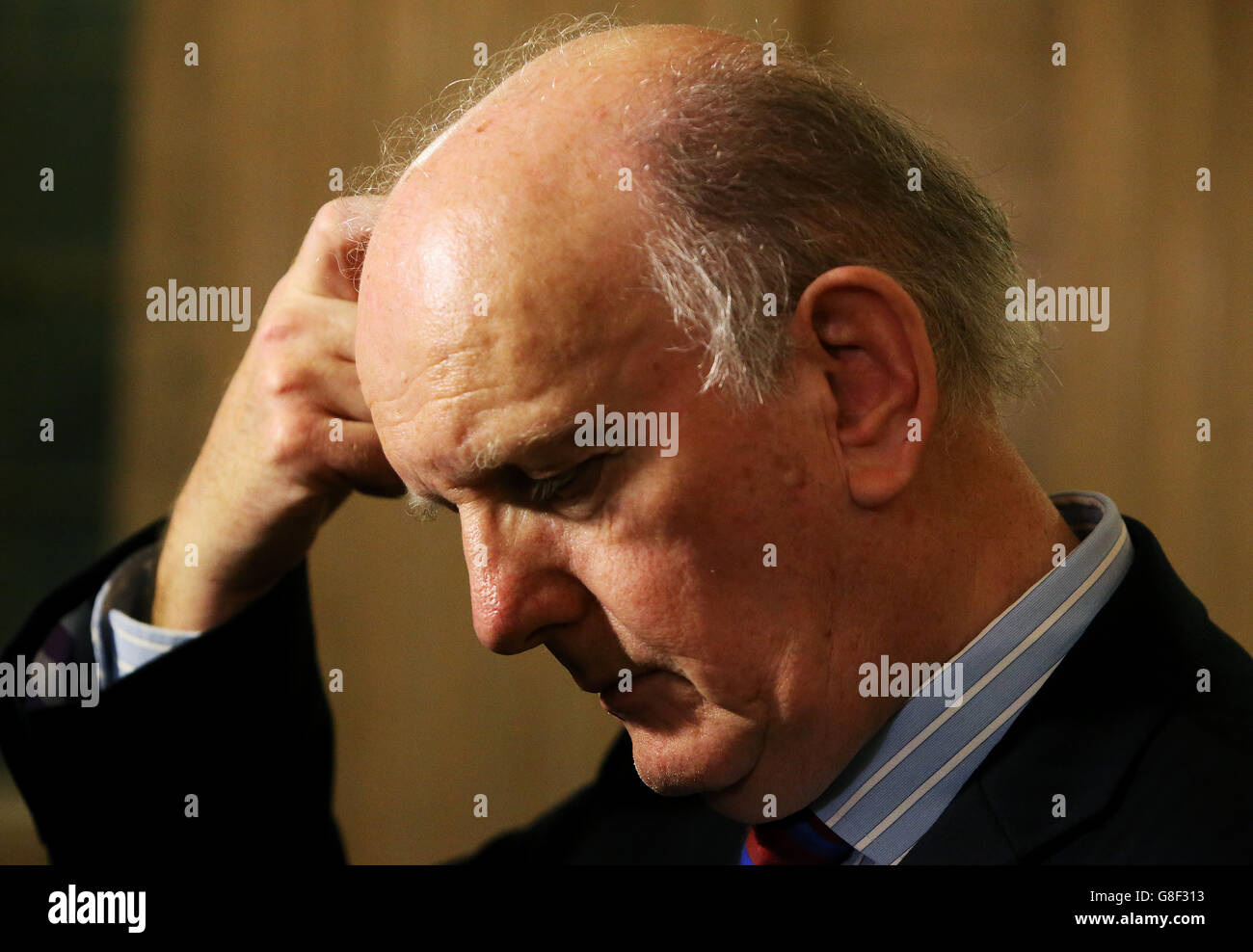 Michael McGimpsey of the UUP speaks to the media at Parliament Buildings at Stormont in Belfast, after a deal to salvage Northern Ireland's crisis-hit power-sharing administration was announced. Stock Photo