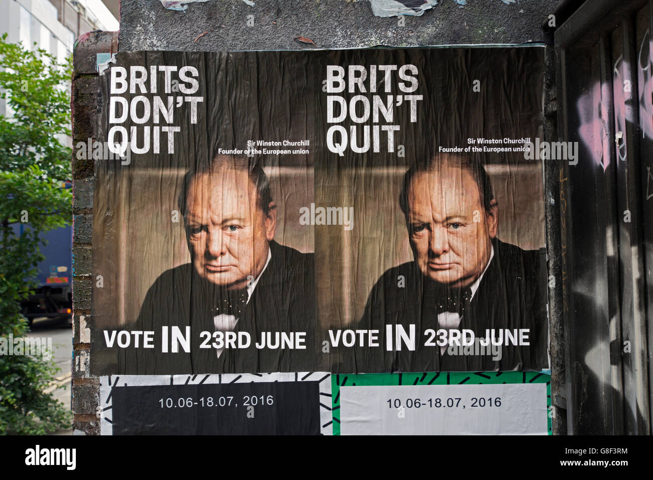 remain-posters-featuring-sir-winston-churchill-on-a-wall-in-redchurch-G8F3RM.jpg