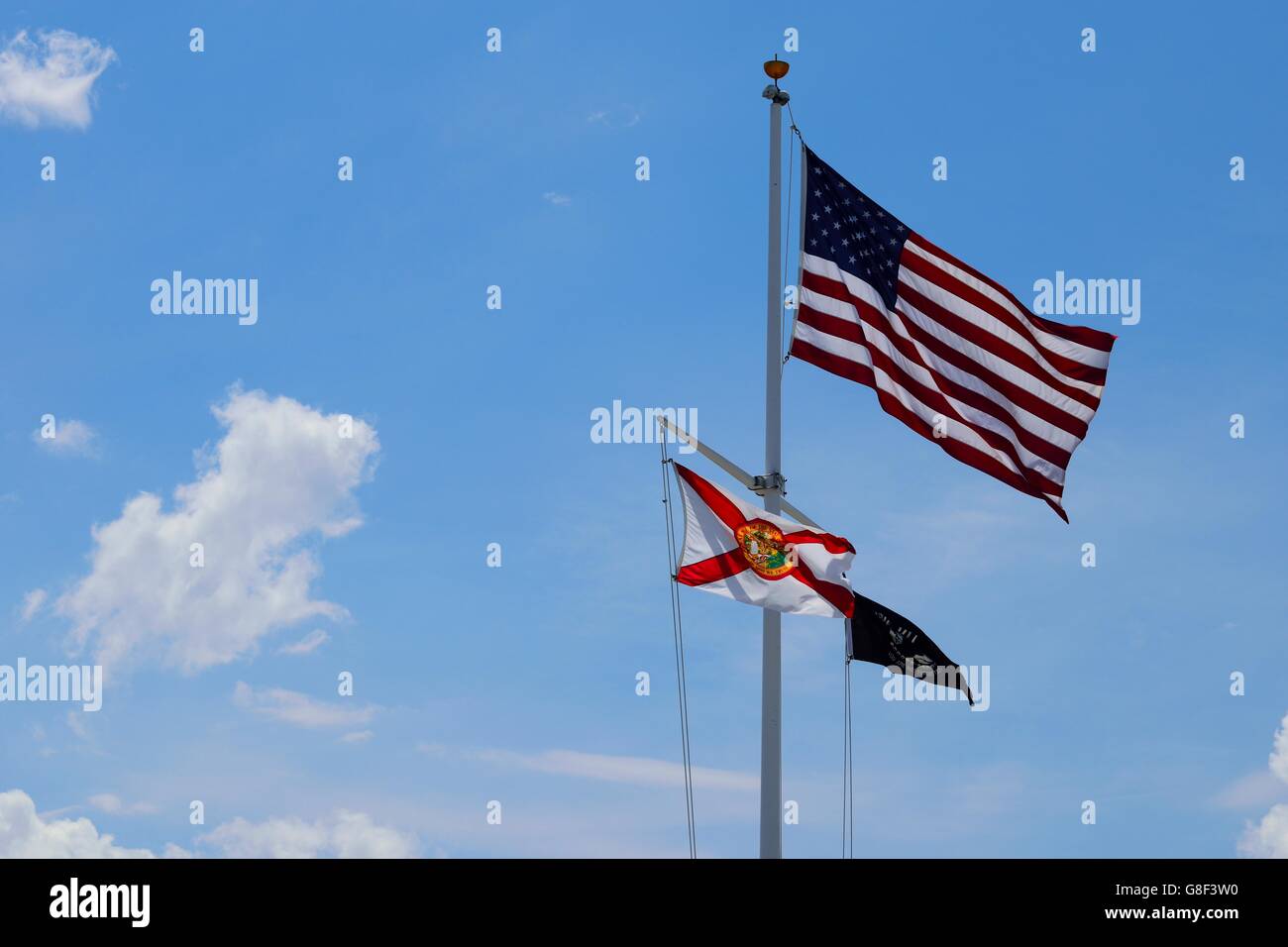 American,POW and Florida flag at Honeymoon Park. Stock Photo