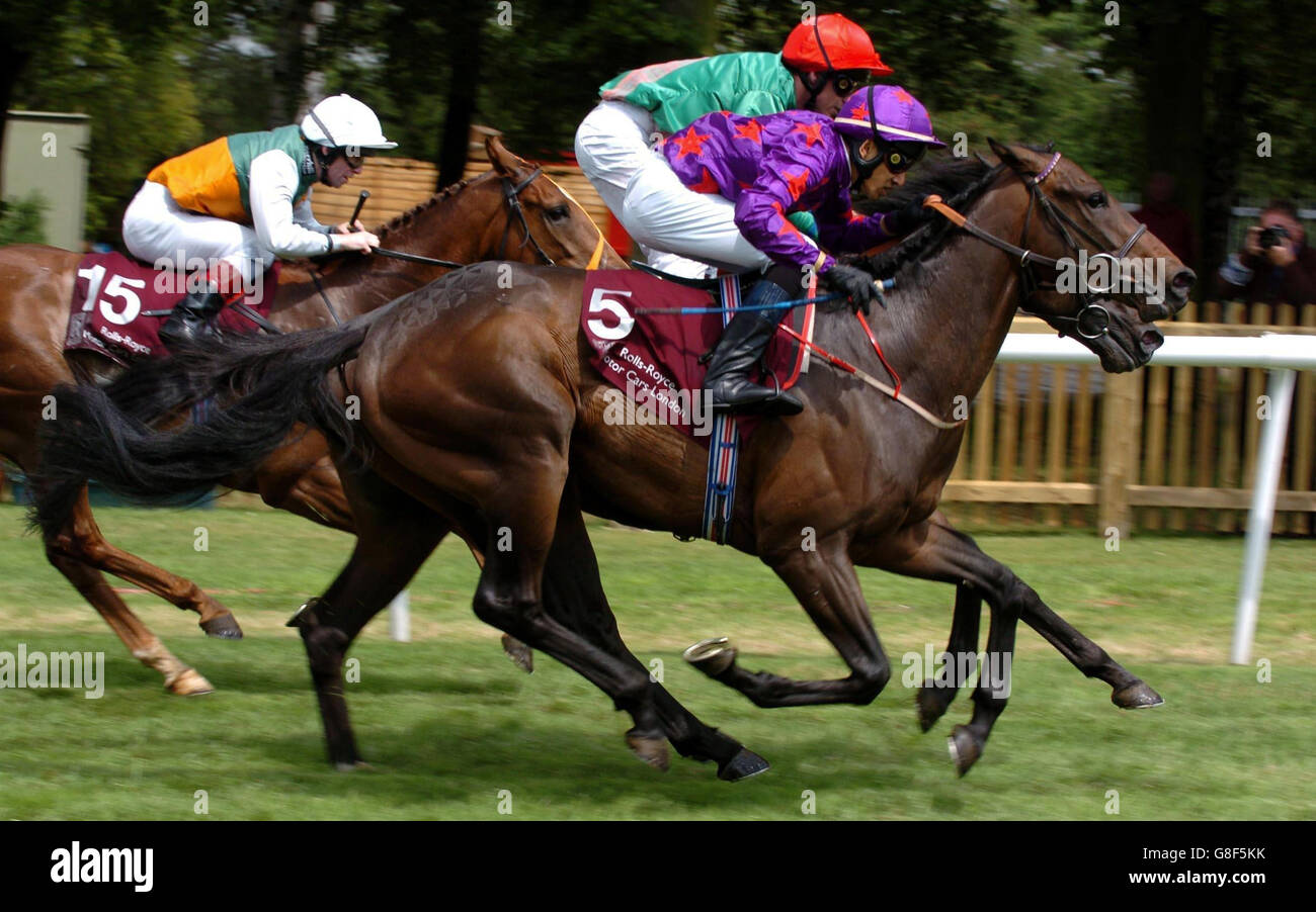Diamonds and Dust (5) ridden by Saleem Golam wins the Rolls Royce Motor