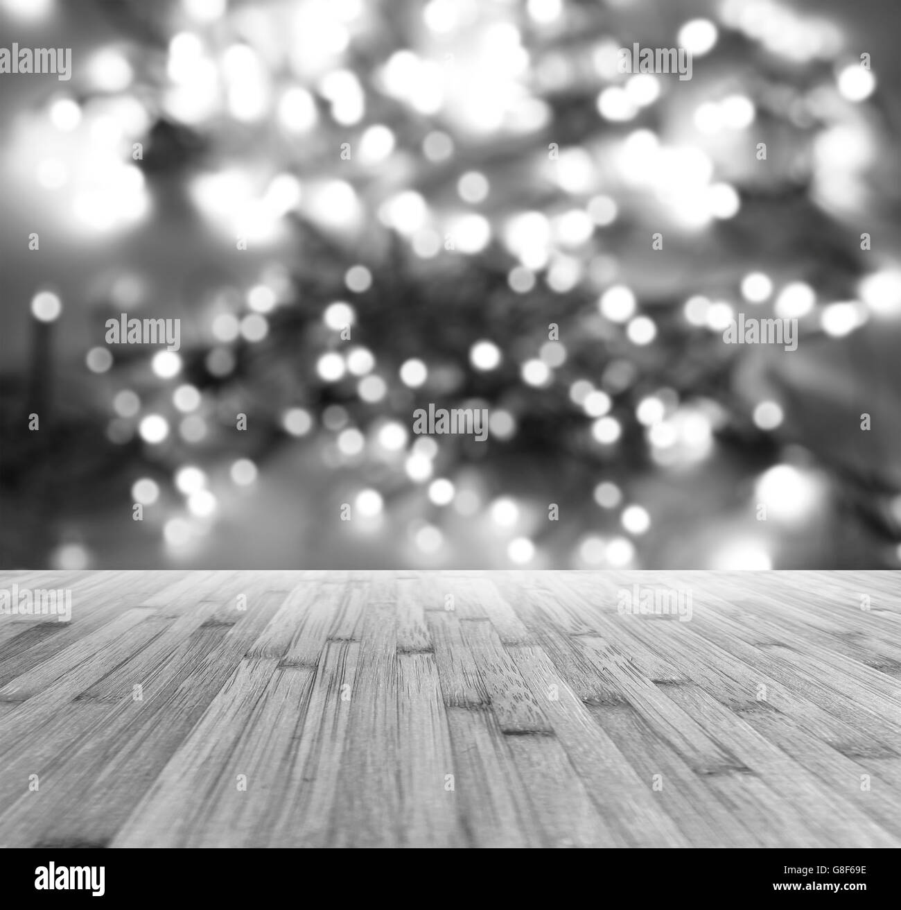 Wooden floor and bright light blurs Stock Photo
