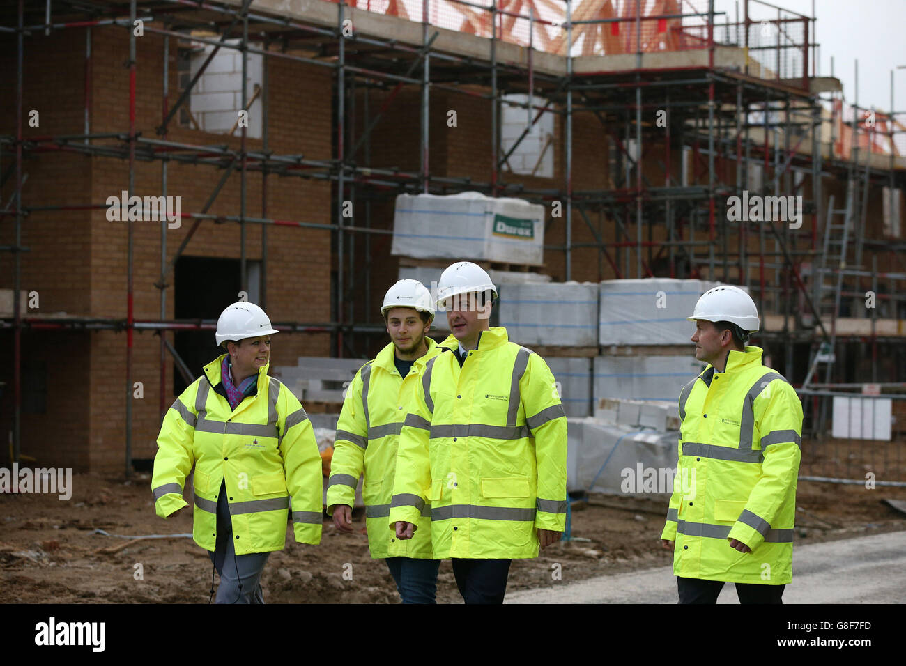 Chancellor of the Exchequer Osborne (second right) during a