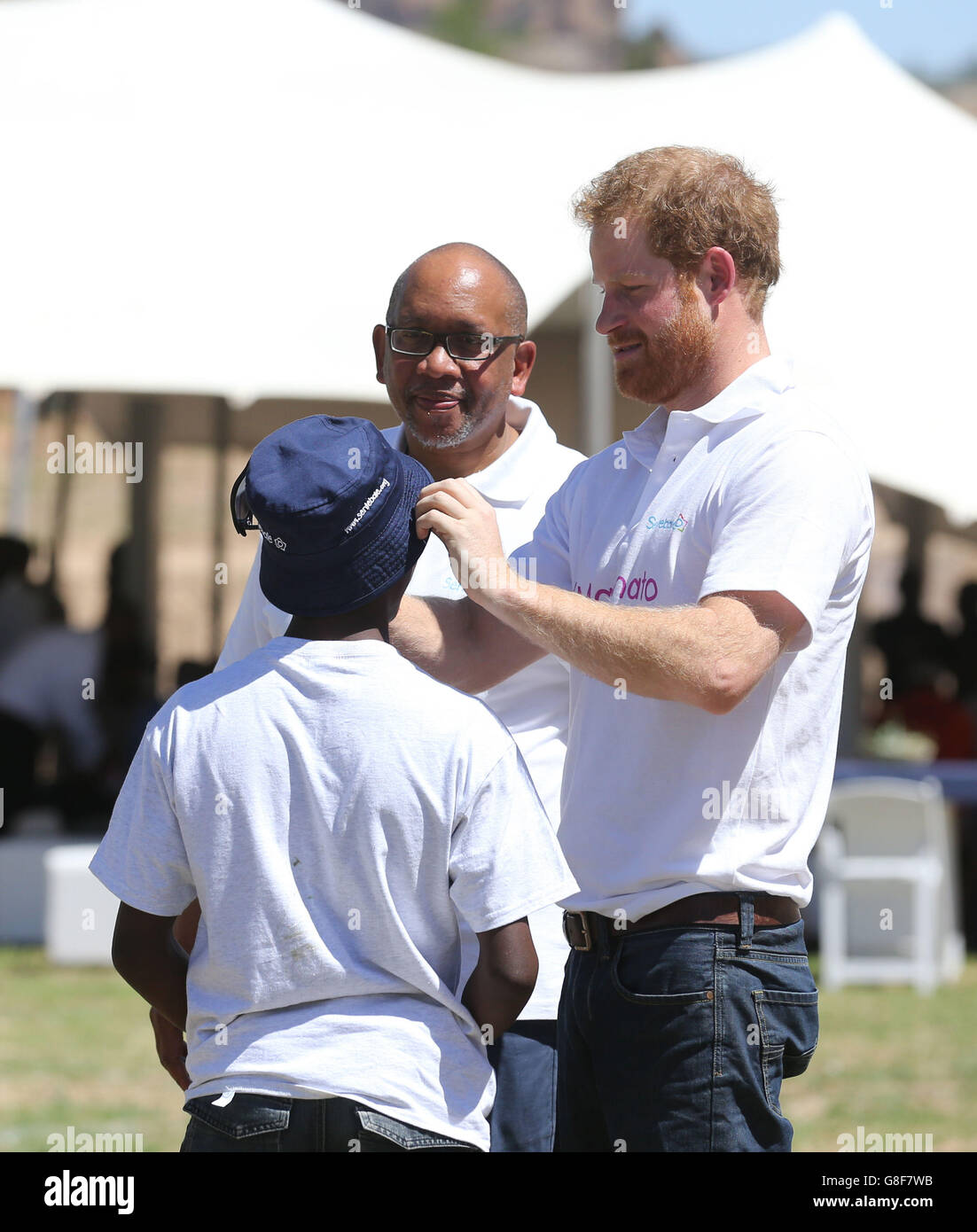 Prince harry with prince seeiso of lesotho and mutsu potsane hires