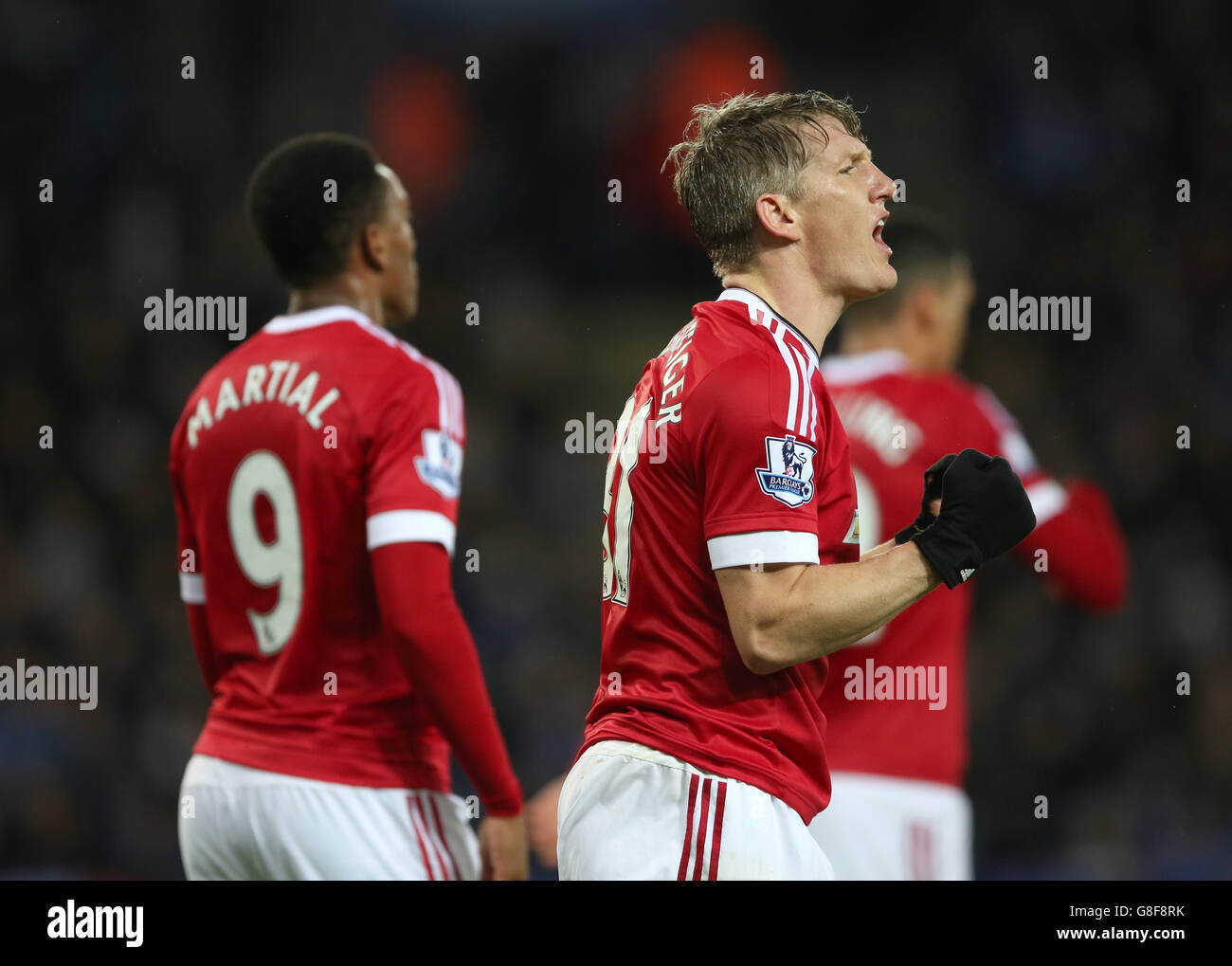 Manchester United's Bastian Schweinsteiger (right) celebrates scoring his side's first goal of the game during the Barclays Premier League match at the King Power Stadium, Leicester. Stock Photo