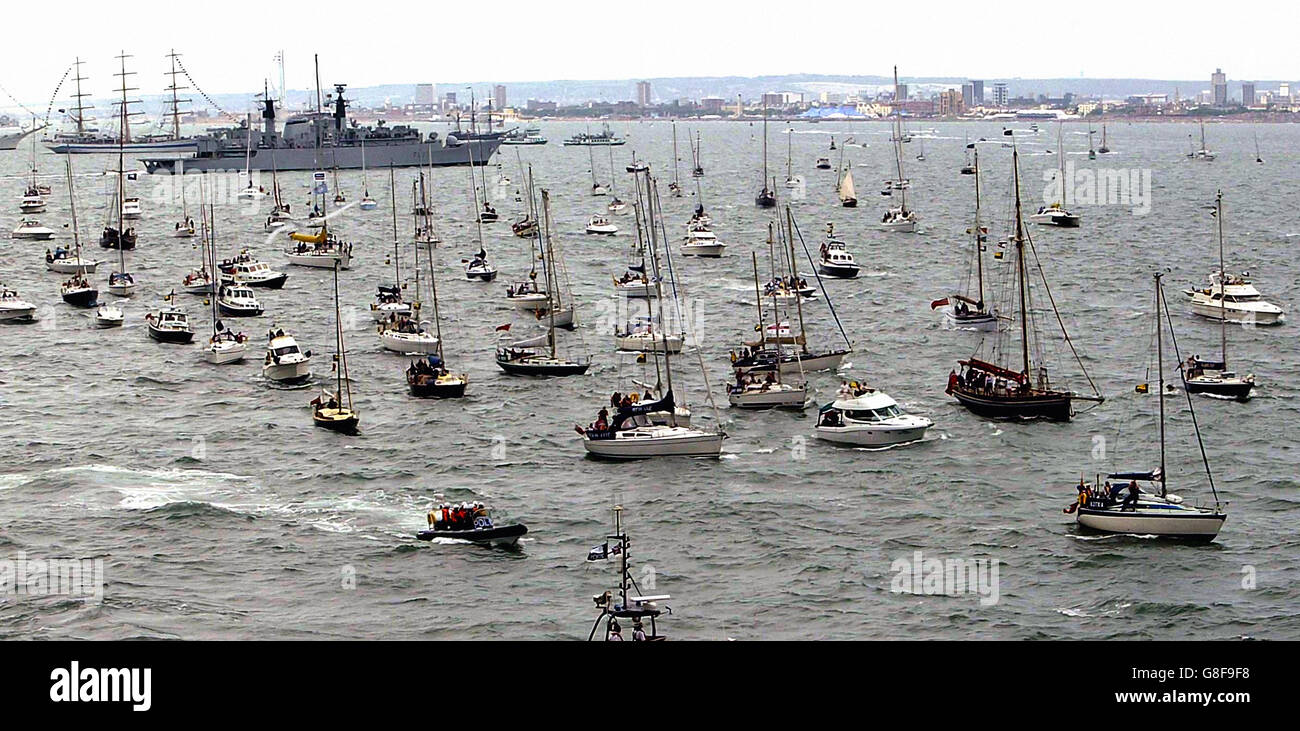 Yachts pass by HMS Endurance at a review of the fleet, Tuesday June 28, 2005. A total of 167 ships from the Royal Navy and 35 nations are taking part in the International Fleet Review at Spithead, off Portsmouth. Stock Photo