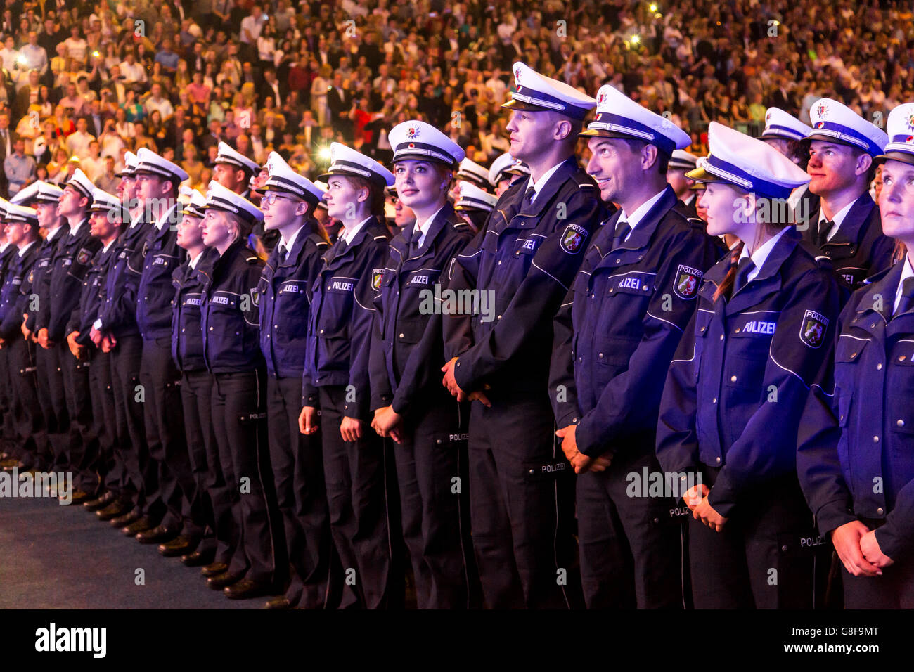 Swearing ceremony of 1891 Commissioner contenders and Commissioner candidates in Cologne's Lanxess Arena, new Police officers Stock Photo