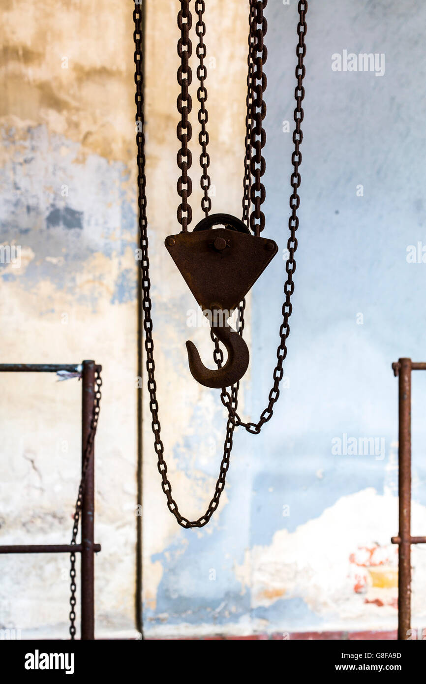 Hook and chains of an old industrial crane Stock Photo Alamy