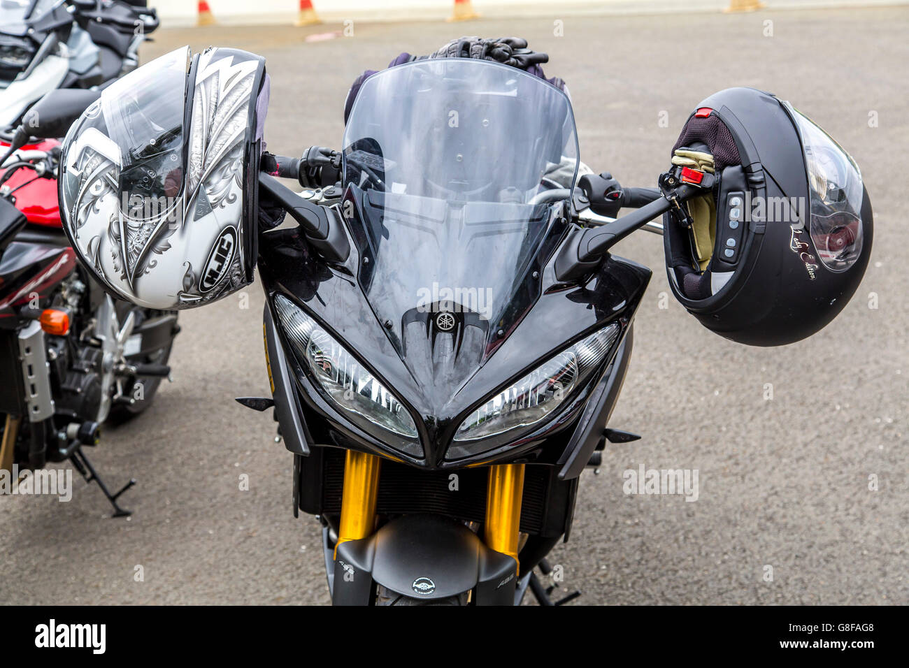 Heavy motorbikes, parked, with helmets, Stock Photo