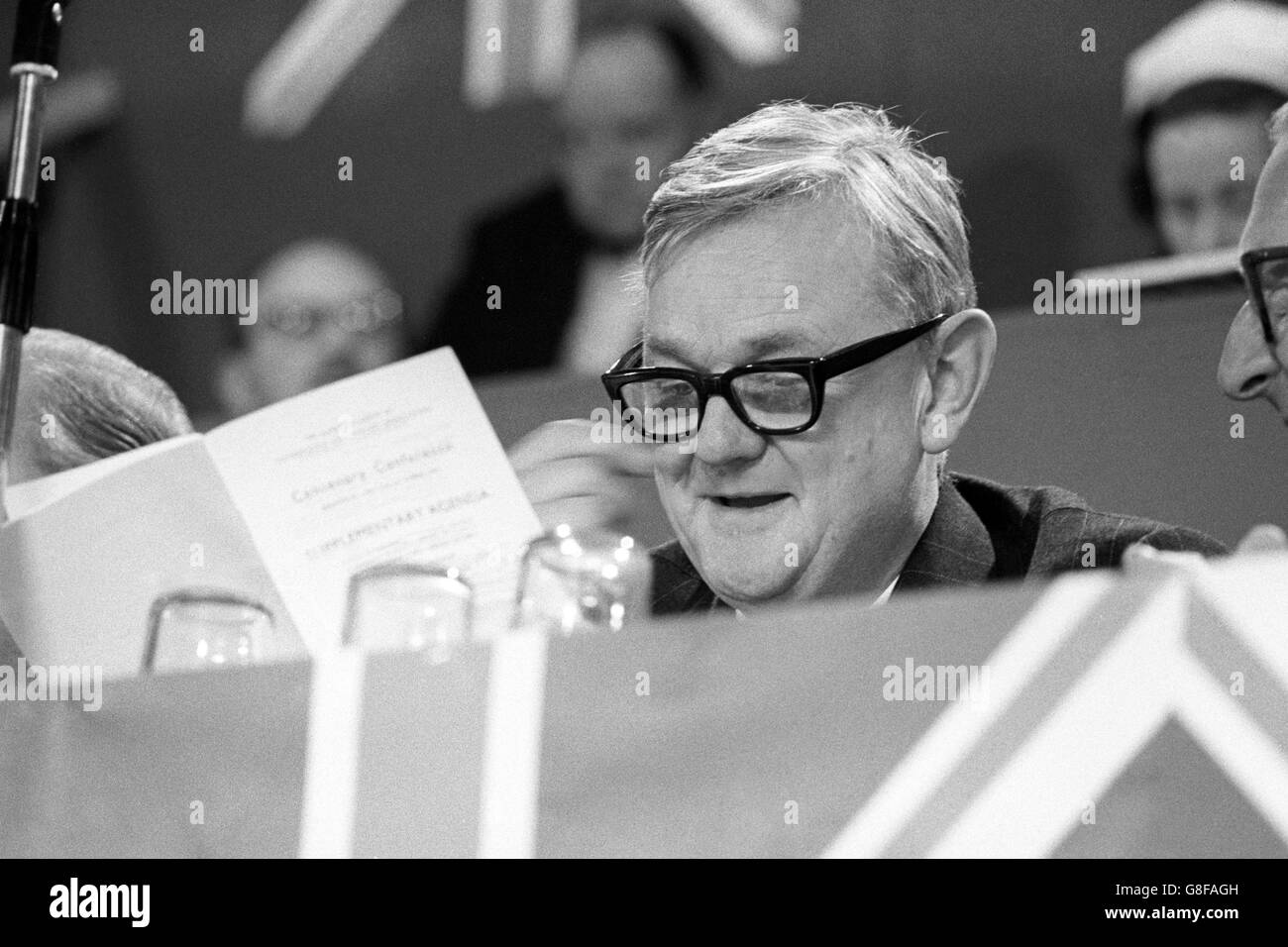 Quinton Hogg QC studies the agenda at the Conservative Party Conference at the Top Rank Centre in Brighton. Stock Photo