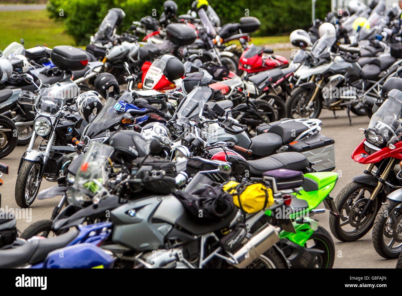 Heavy motorbikes, parked, with helmets, Stock Photo