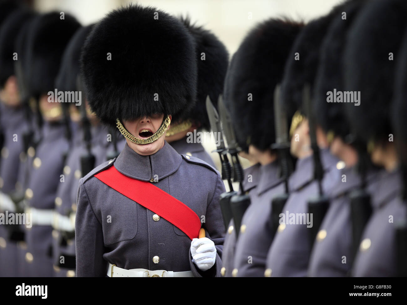 Scots Guards form up in a line ahead of the arrival of Indian Prime Minister Narendra Modi at The Treasury in London, at the start an official three day visit. Stock Photo
