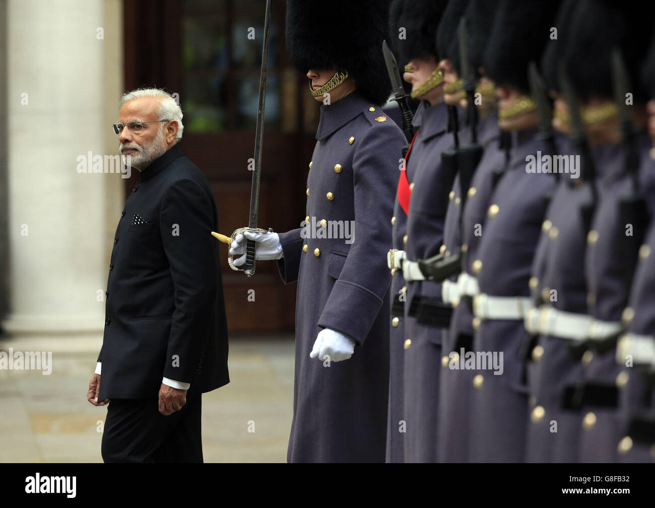 Indian Prime Minister Narendra Modi inspects F Company, The Scots Guards, during his official welcome at The Treasury in London, at the start an official three day visit. Stock Photo