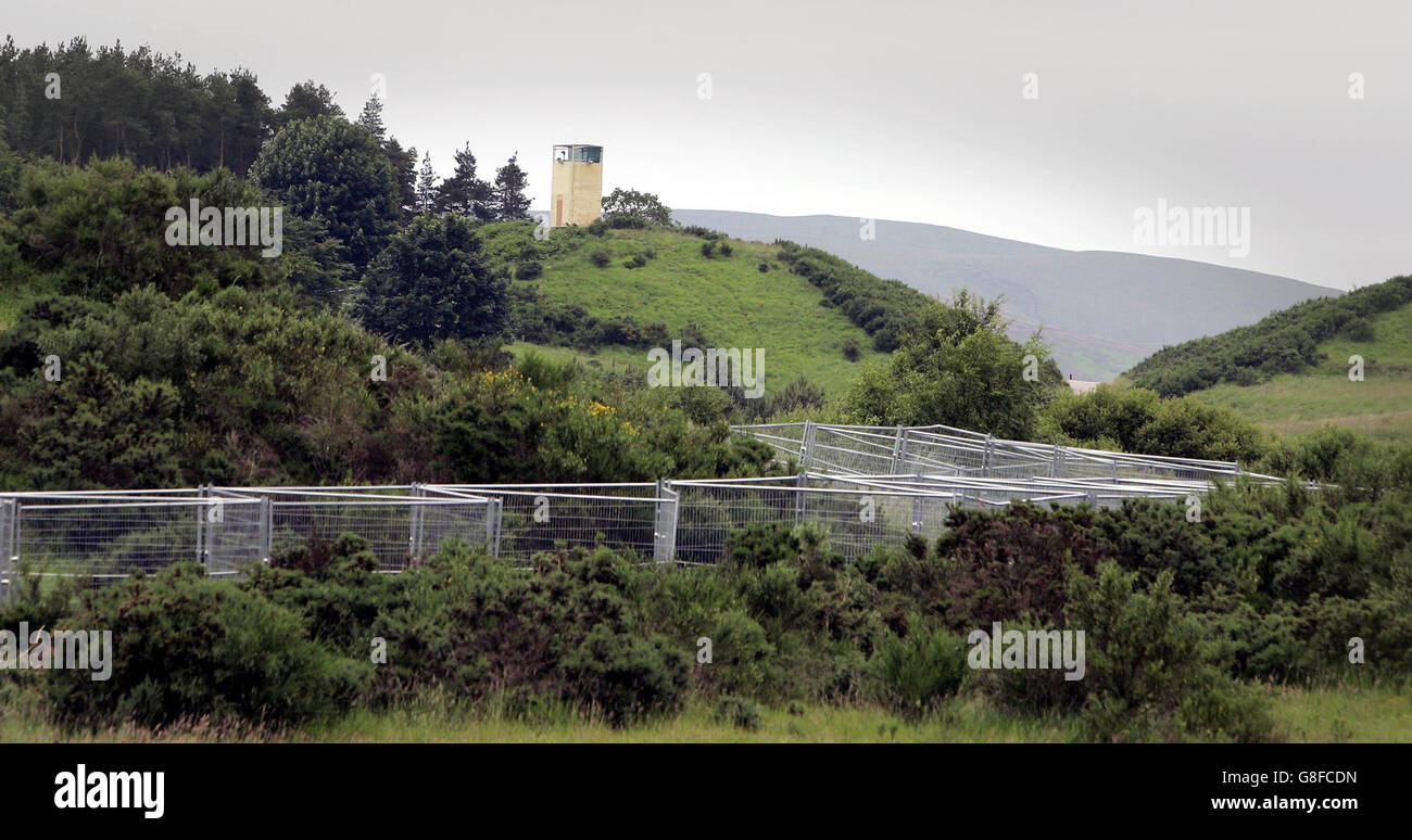 A general view of a watch tower and security fences around the Gleneagles Estate at the same time the Make Poverty History March is being held in Edinburgh. Stock Photo