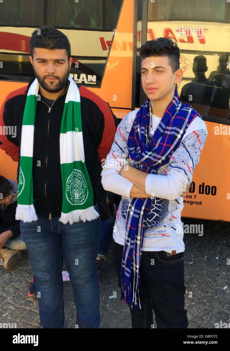 24-year-old Abdel Baset (left) wearing a Celtic FC scarf he hopes will keep  him warm as winter approaches Stock Photo - Alamy