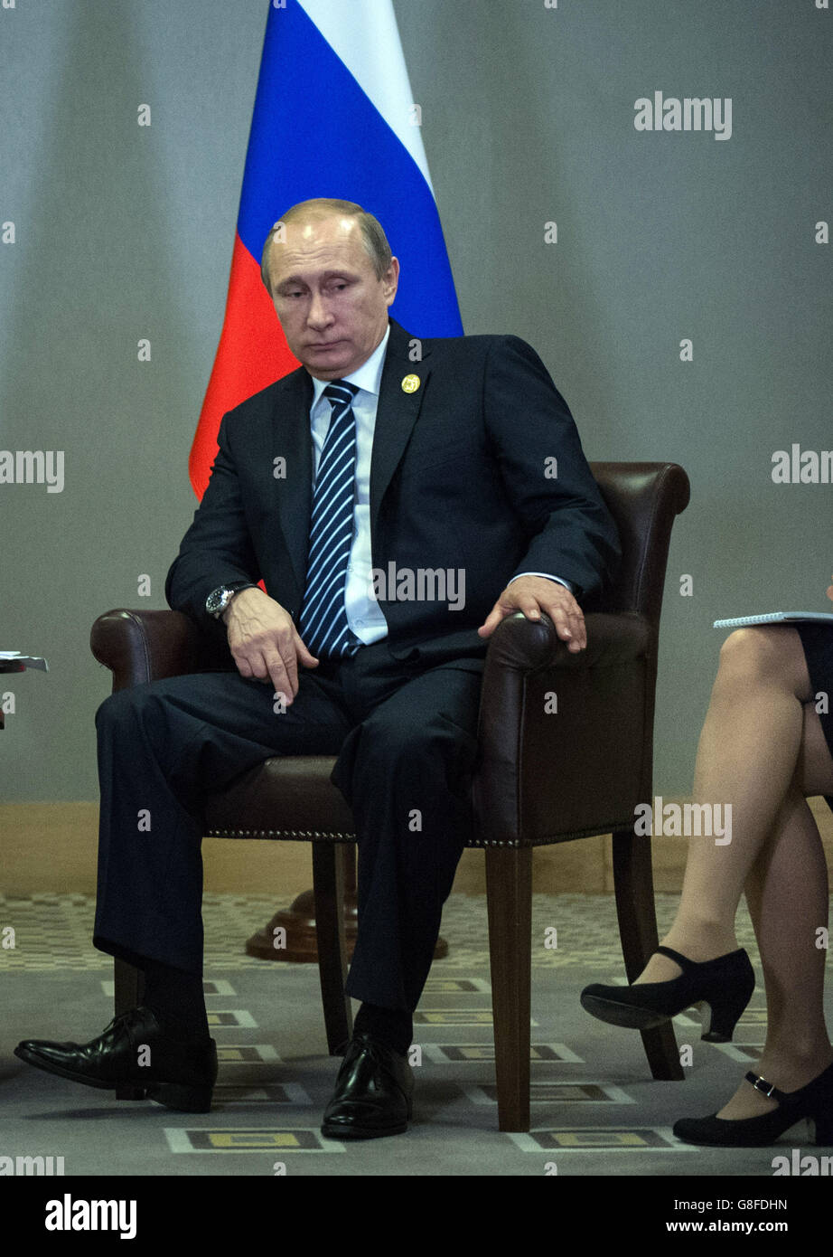 Russian President Vladimir Putin during a meeting with Prime Minister David Cameron at the G20 Turkey Leaders Summit in Antalya, Turkey. Stock Photo
