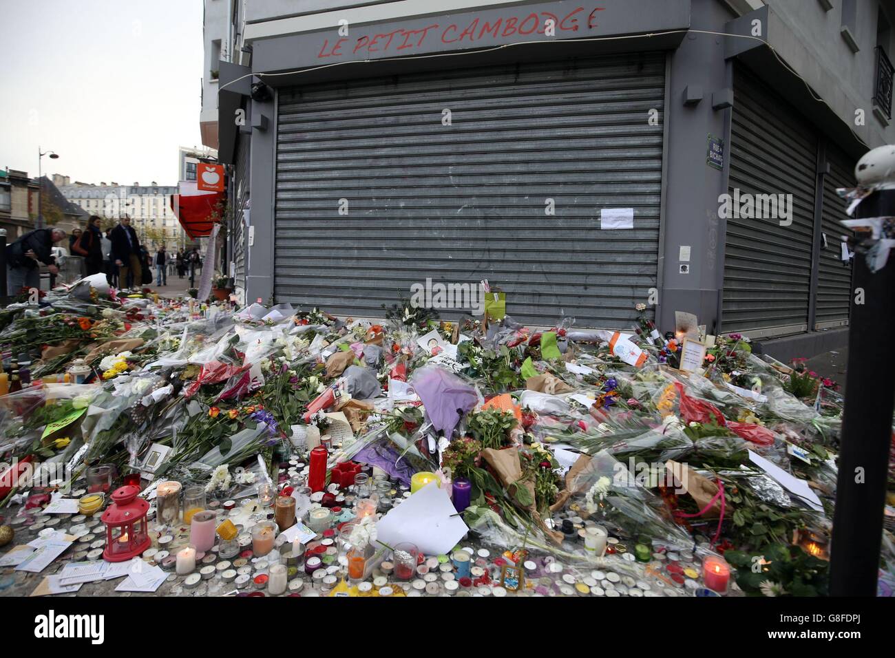 Tributes continue to be left at the Le Petit Cambodge in Paris following the terrorist attacks on Friday evening. Stock Photo