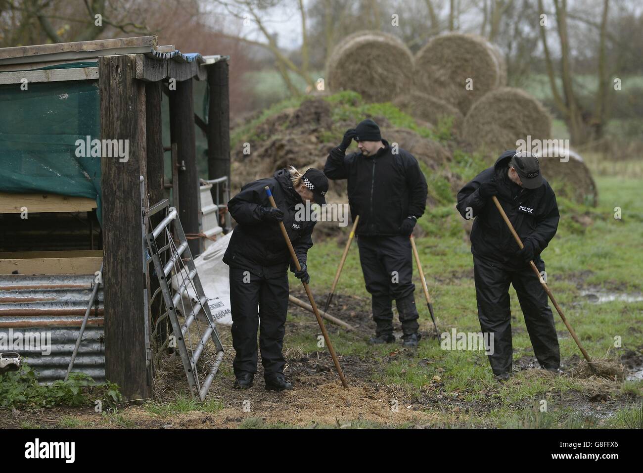 Police search a field off Ashby Road in Belton, Leicestershire for