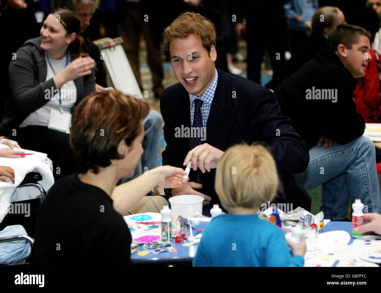 Prince William paints with young patients during a visit to Auckland's Starship Childrens Hospital. Stock Photo