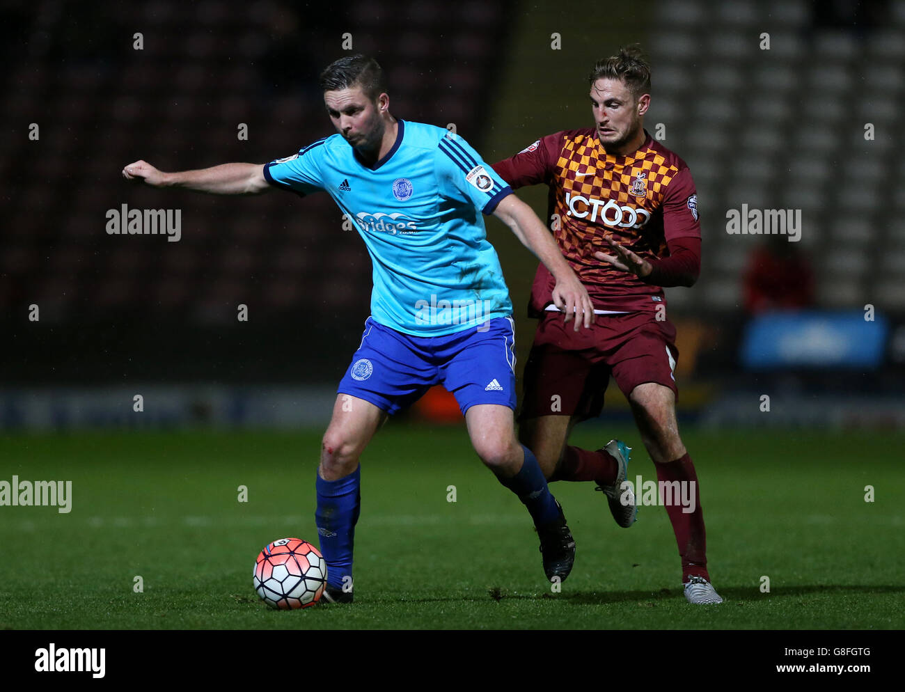 Bradford City's Gary Liddle (right) and Aldershot Town's Richard Brodie battle for the ball during the Emirates FA Cup first round replay match at Valley Parade, Bradford. Stock Photo