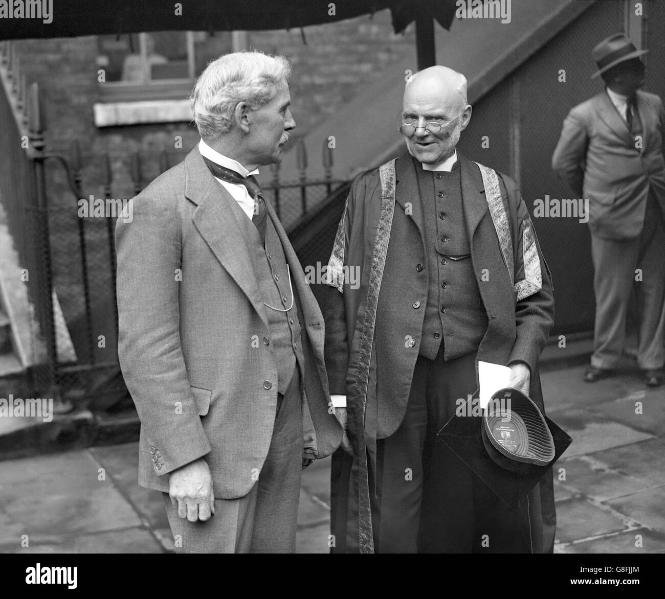 Prime Minister Ramsay MacDonald speaks with vice-chancellor Dr Scott Lidgett, when he inaugurated an Anglo-American Historical Conference at University College, London. Stock Photo