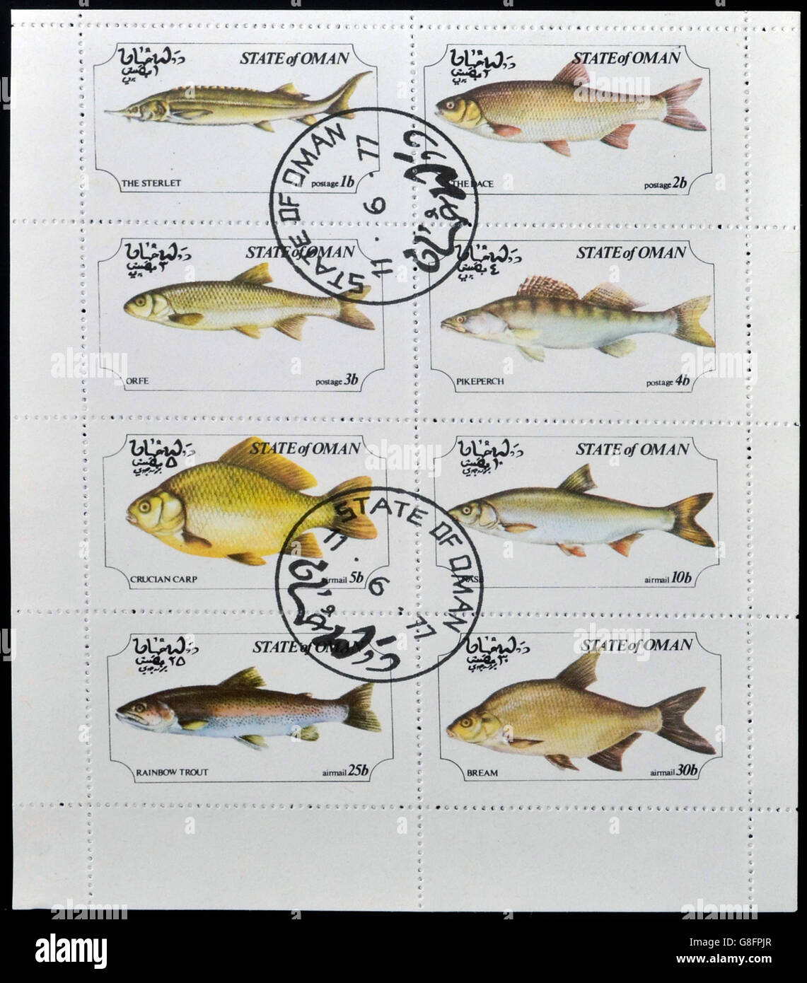 OMAN - CIRCA 1973: A collection stamps printed in Oman showing eight kinds of fish, circa 1973 Stock Photo