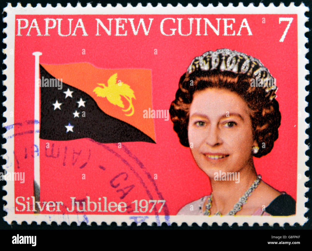 PAPUA NEW GUINEA - CIRCA 1977: stamp printed in Papua New Guinea shows aportrait elizabeth II, silver jubilee in commemoration, Stock Photo