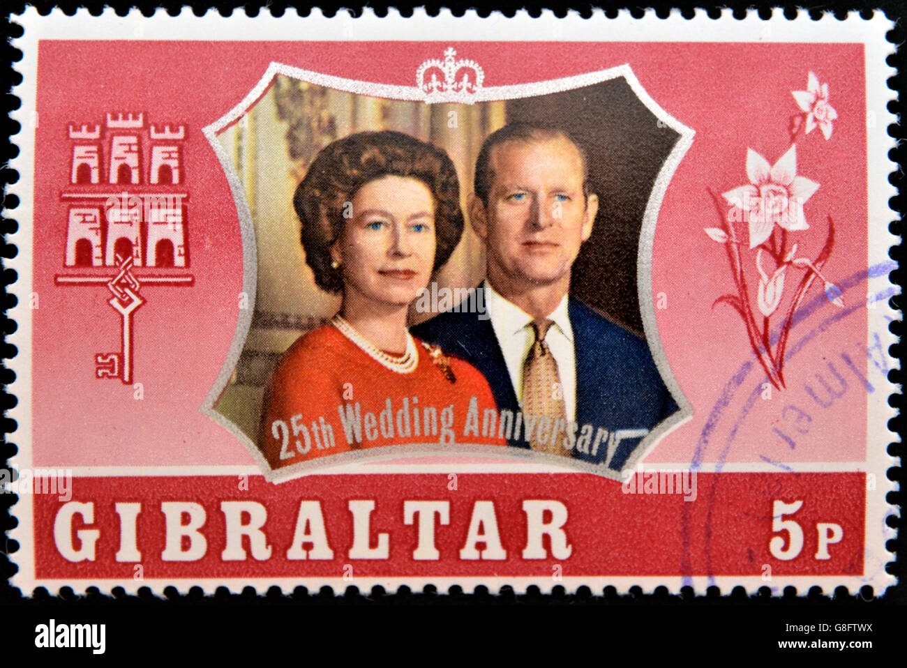 GIBRALTAR - CIRCA 1972: A stamp printed in Gibraltar shows portrait of the Duke of Edinburgh and Queen Elizabeth II commemoracio Stock Photo