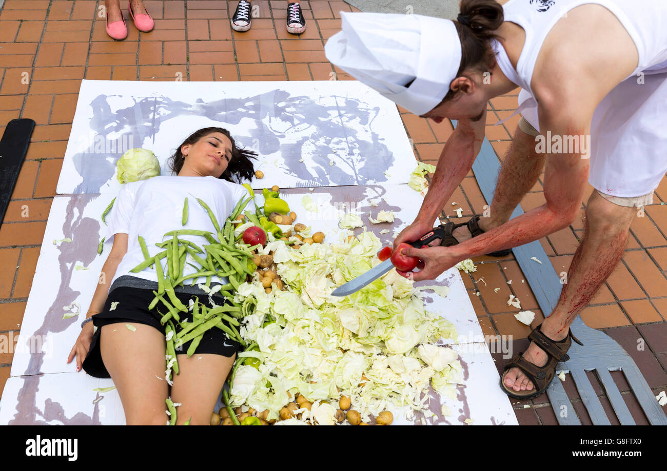 Sofia, Bulgaria - June 21, 2016: Vegans and vegetarians animal rights activists are cooking humans during a protes against killi Stock Photo
