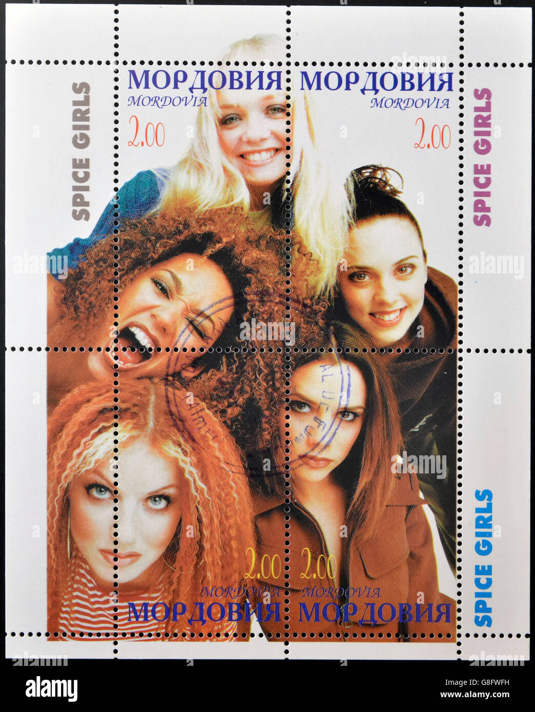 MOLDOVA - CIRCA 2000: A stamp printed in Moldova shows spice girls, circa 2000 Stock Photo