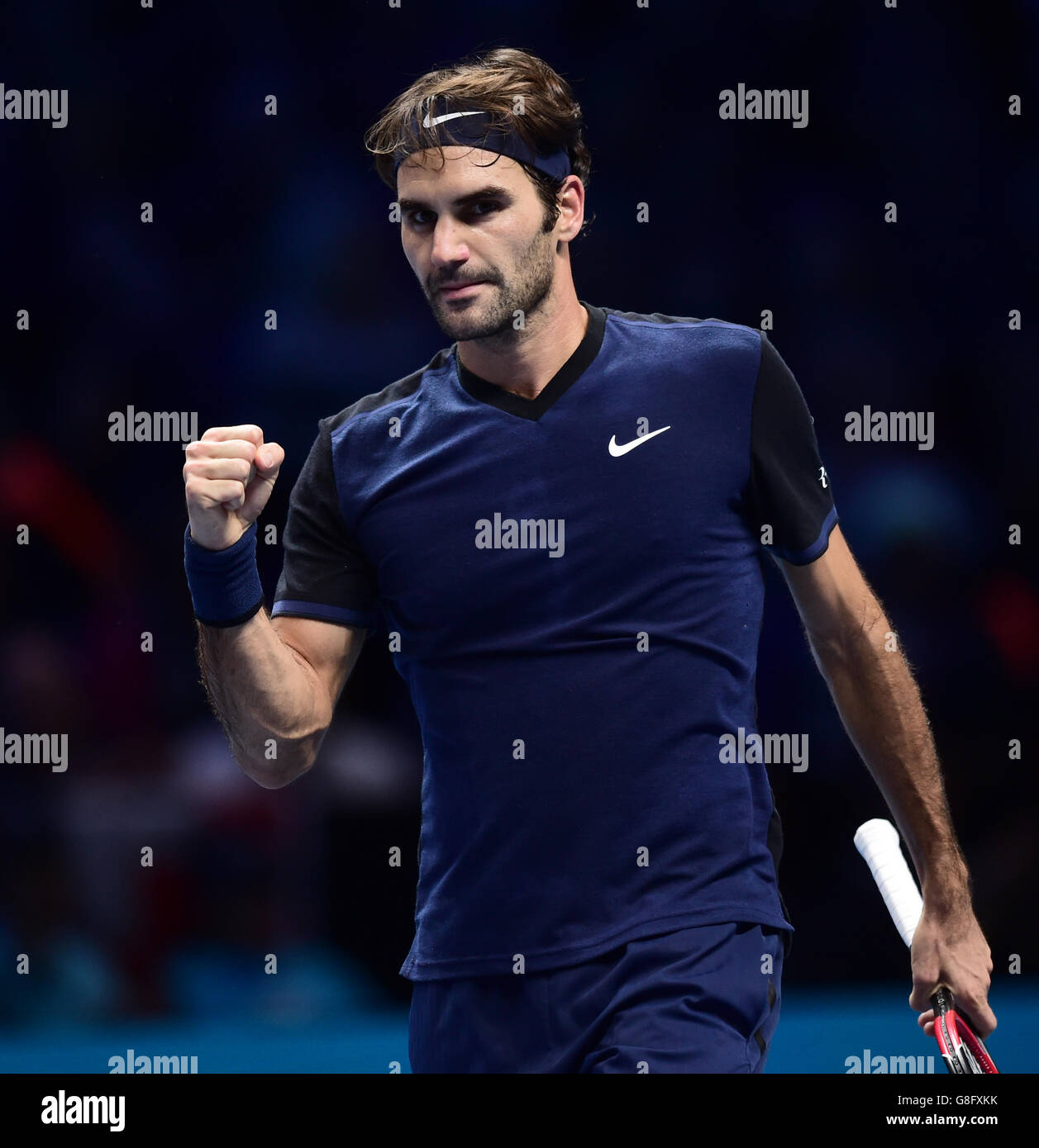 Switzerland's Roger Federer celebrates his win over Japan's Kei Nishikori during day five of the ATP World Tour Finals at the O2 Arena, London. PRESS ASSSOCIATION Photo. Picture date: Thursday November 19, 2015. See PA story TENNIS London. Photo credit should read: Adam Davy/PA Wire. Stock Photo