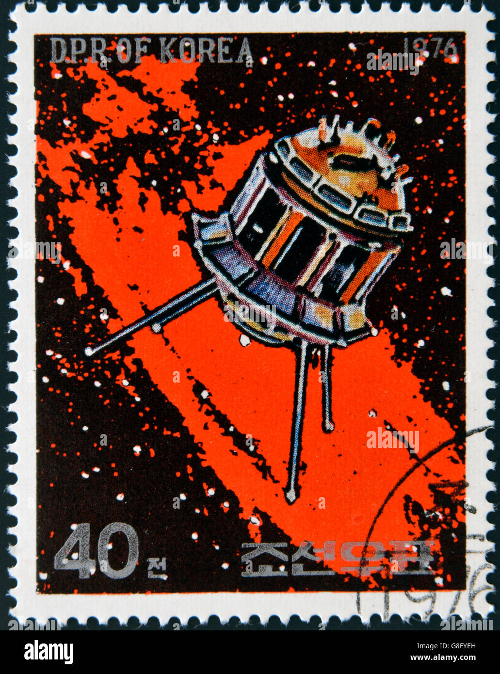 NORTH KOREA - CIRCA 1976: A stamp printed in North Korea shows a space station against a sea of stars and the Milky Way galaxy, Stock Photo