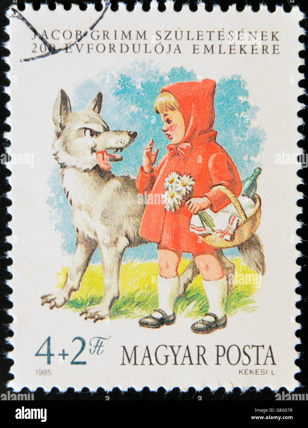 HUNGARY - CIRCA 1985: A stamp printed in Hungary shows Little Red Riding Hood and the Wolf, circa 1985 Stock Photo