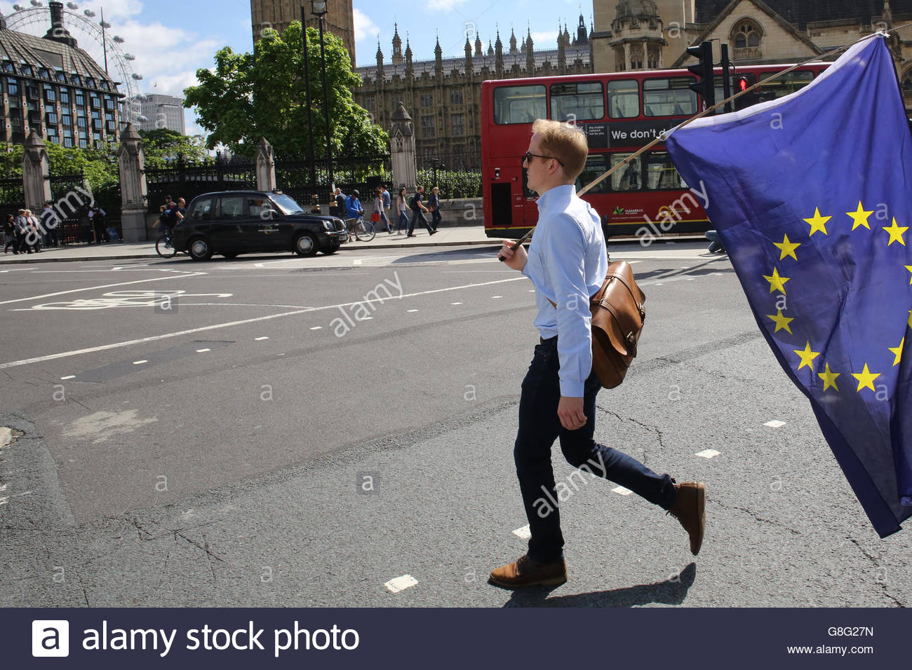 A pro-Europe protestor walks past parliament after the announcement of the referendum result. Stock Photo