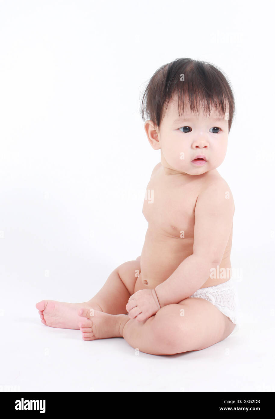Portrait of little cute baby on a white background Stock Photo - Alamy