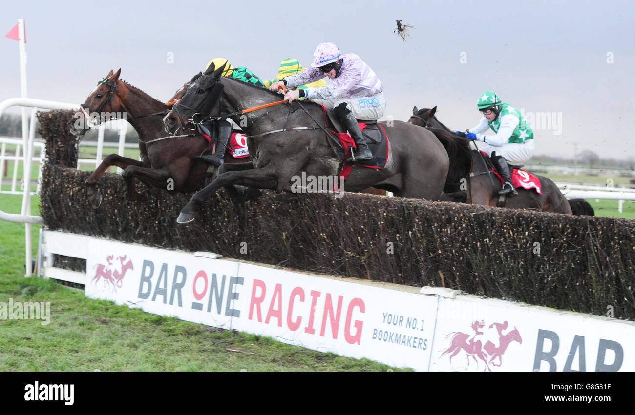 Bless the Wings ridden by Jack Kennedy (front) jumps the last before winning the Bar One racing Porterstown Handicap Chase during day two of the Fairyhouse Winter Festival at Fairyhouse Racecourse, Ratoath. Stock Photo