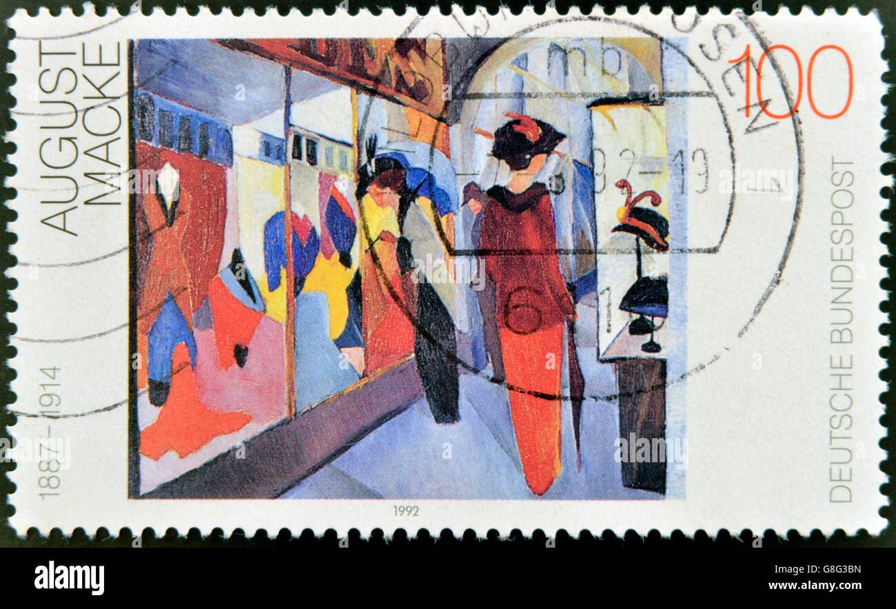 GERMANY - CIRCA 1992: stamp printed in Germany showsthe painting "Fashion Shop" by August Macke (1887-1914), circa 1992. Stock Photo