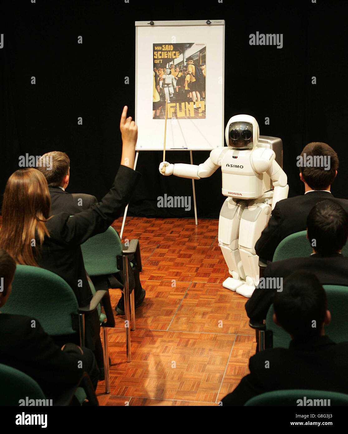 ASIMO brings engineering to life at the Youth Engineering Summit for the pupils of Light Hall School. Stock Photo