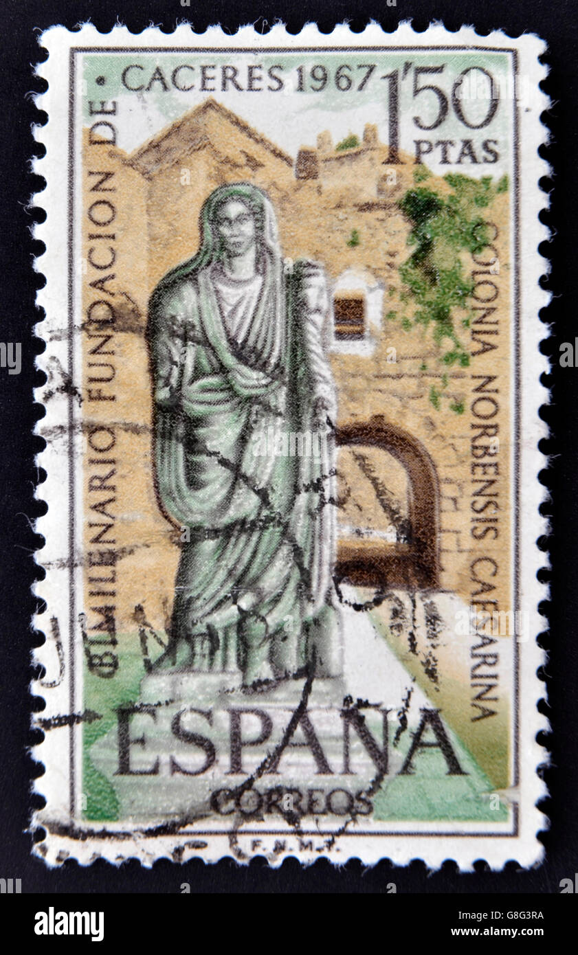 SPAIN-CIRCA 1967: A stamp printed in Spain shows a picture of a Roman matron and the Arc of Christ, two thousandth anniversary o Stock Photo