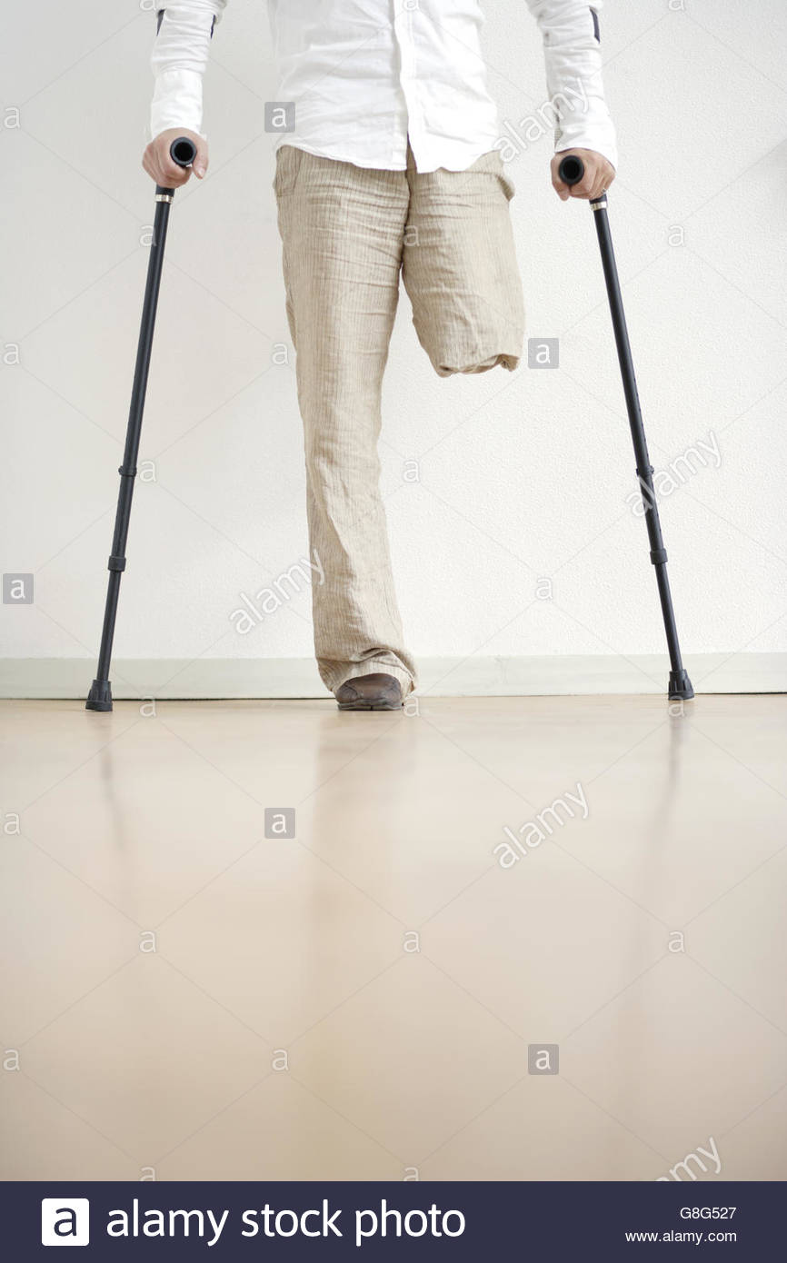 Crutches Amputee Stock Photos & Crutches Amputee Stock Images - Alamy