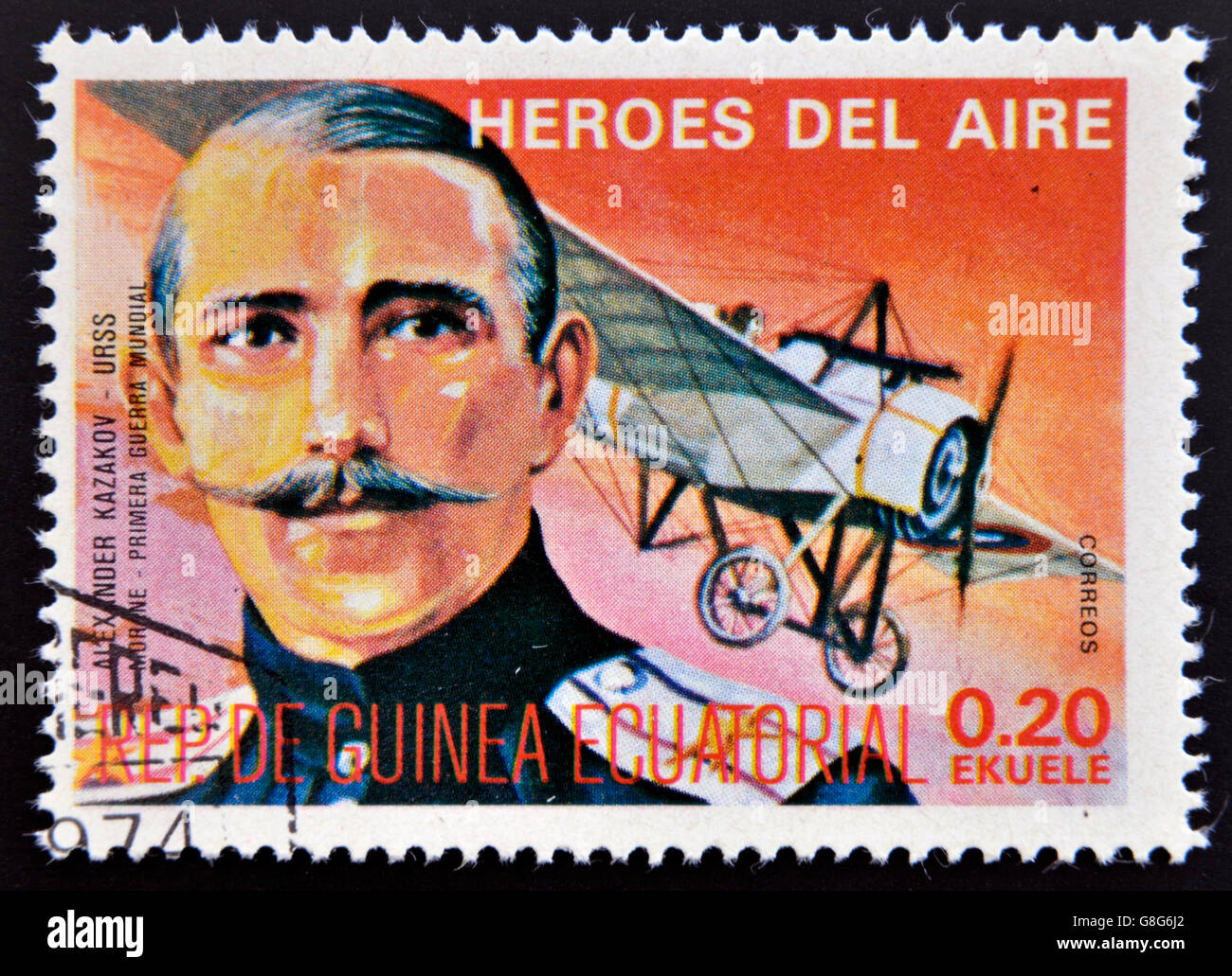 EQUATORIAL GUINEA - CIRCA 1974: stamp printed in Guinea dedicated to air heroes, shows Alexander Kazakov, historic aviator Stock Photo