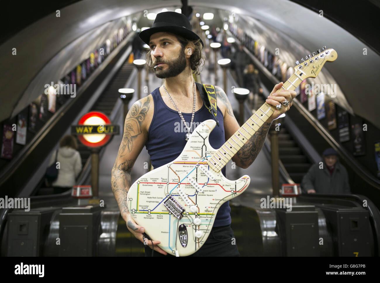 Musician James Black unveils a special edition Fender Stratocaster guitar illustrated with the London Underground map at St John's Wood Tube station, to celebrate Transport for London and the London Transport Museum's Transported by Design programme. Stock Photo