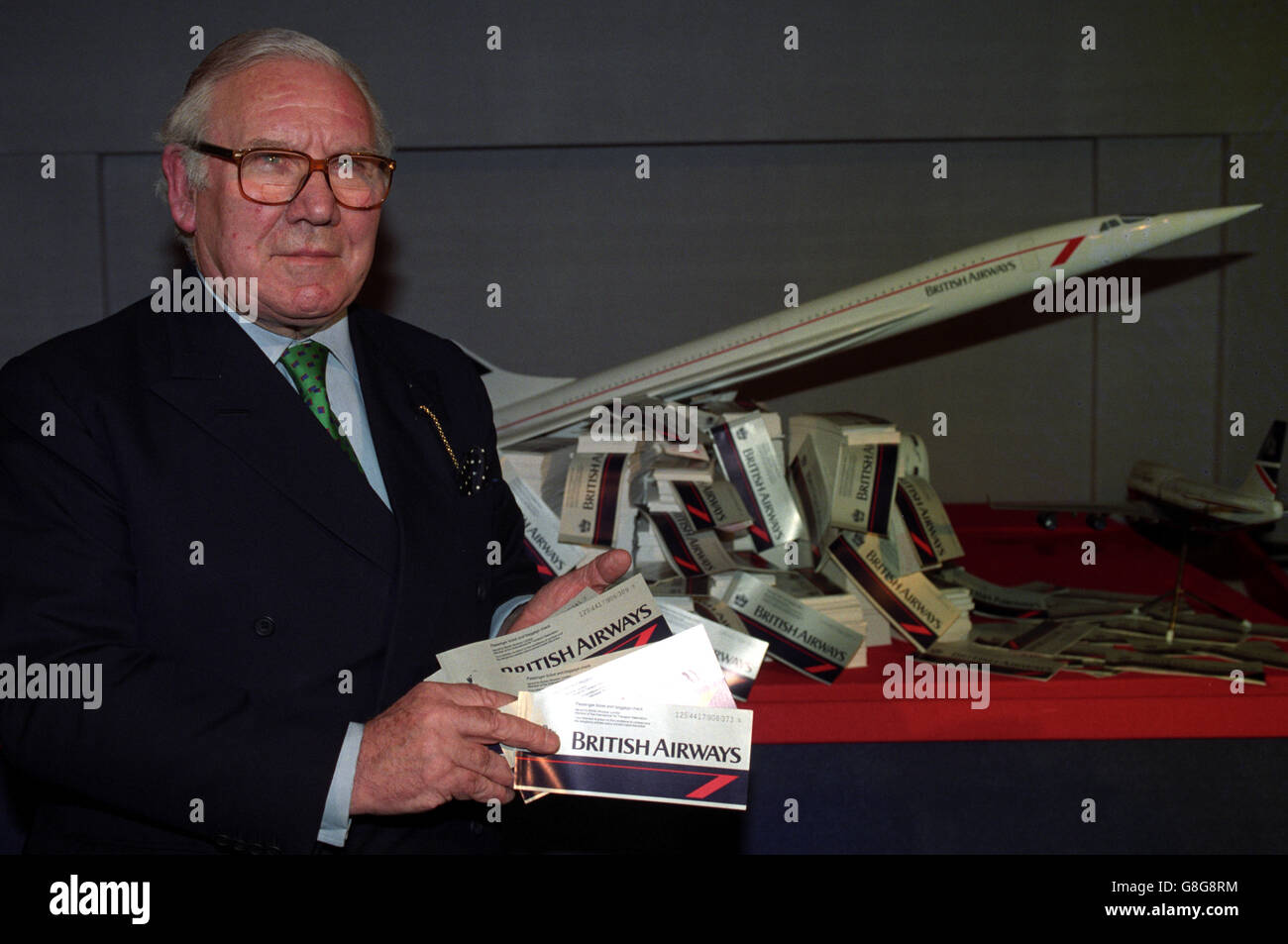 British Airways chairman Lord King with thousands of tickets at a press