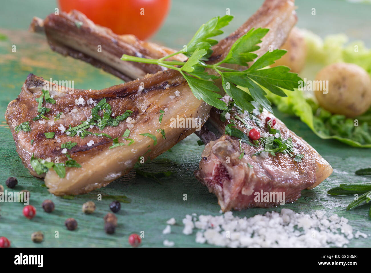 Roasted lamb chops with herbs and pepper Stock Photo Alamy
