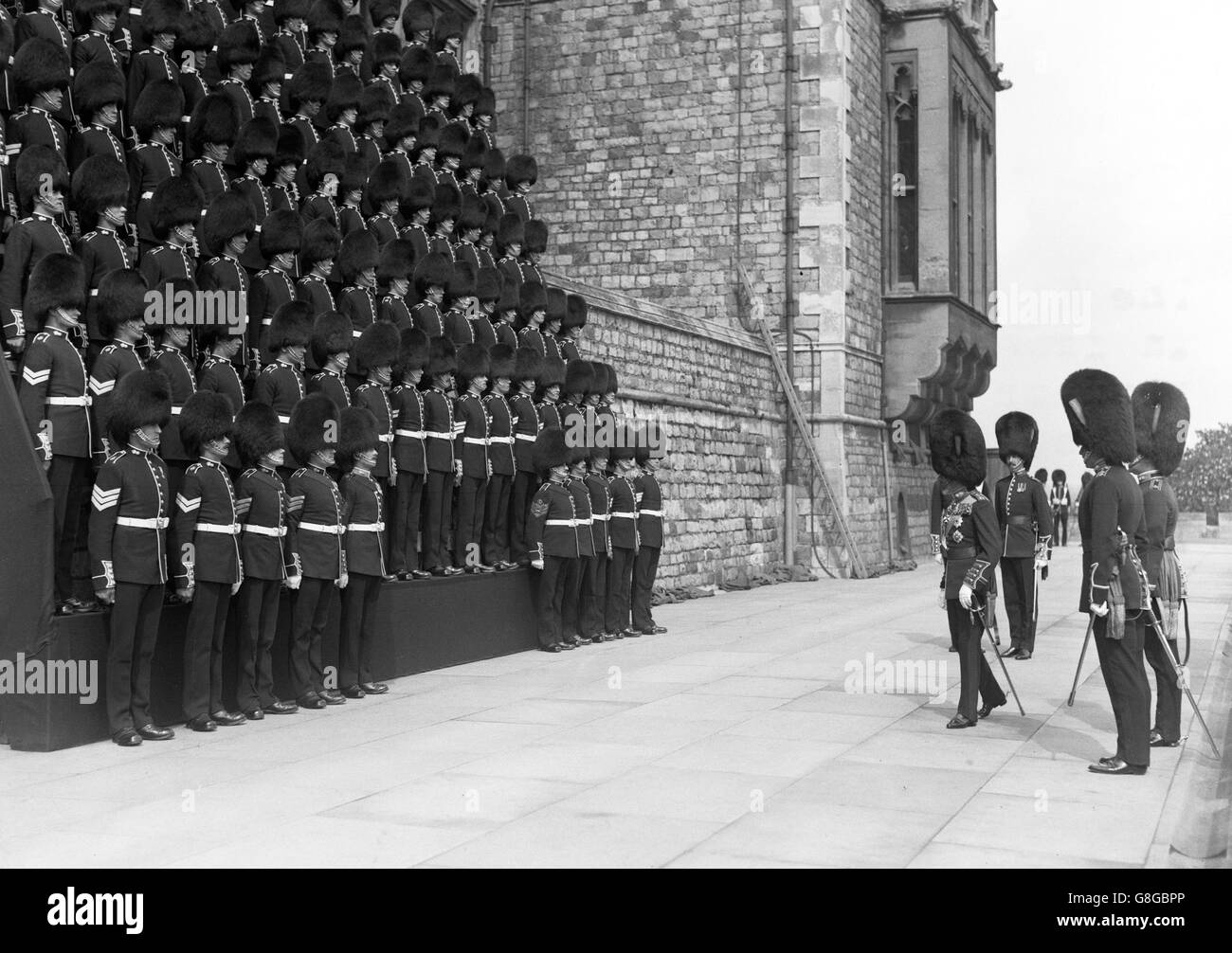 King George V thanks the officers and men of the King's Company of the 1st Battalion Grenadier Guards, after he had inspected them at Windsor. Stock Photo