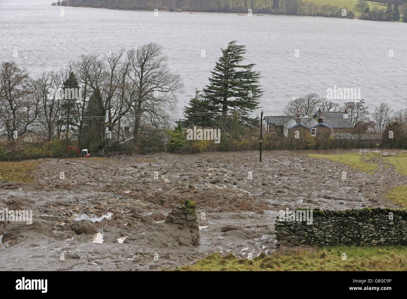 A Mudslide which has hit two houses on the banks of Ullswater, Cumbria after Storm Desmond hit the area last weekend. Stock Photo