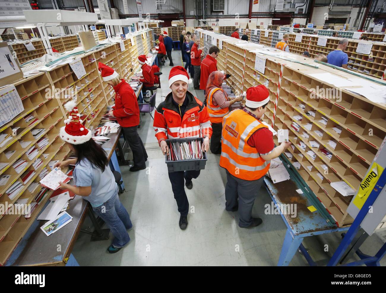 Employees at royal mails glasgow mail centre hires stock photography