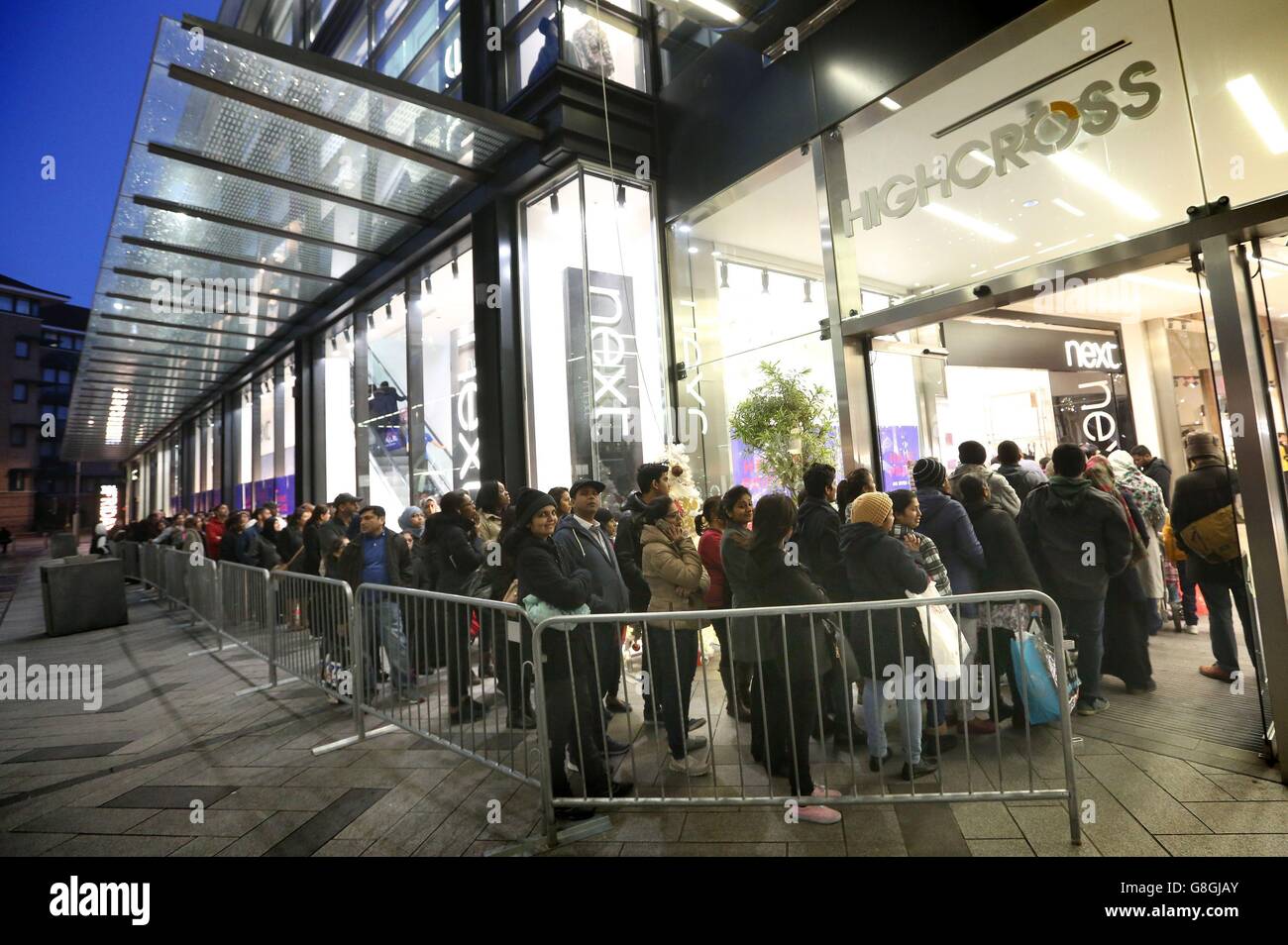 EDITORIAL USE ONLY Shoppers queue to enter a store at&Ecirc;Highcross shopping centre in Leicester during the Boxing Day sales. Stock Photo