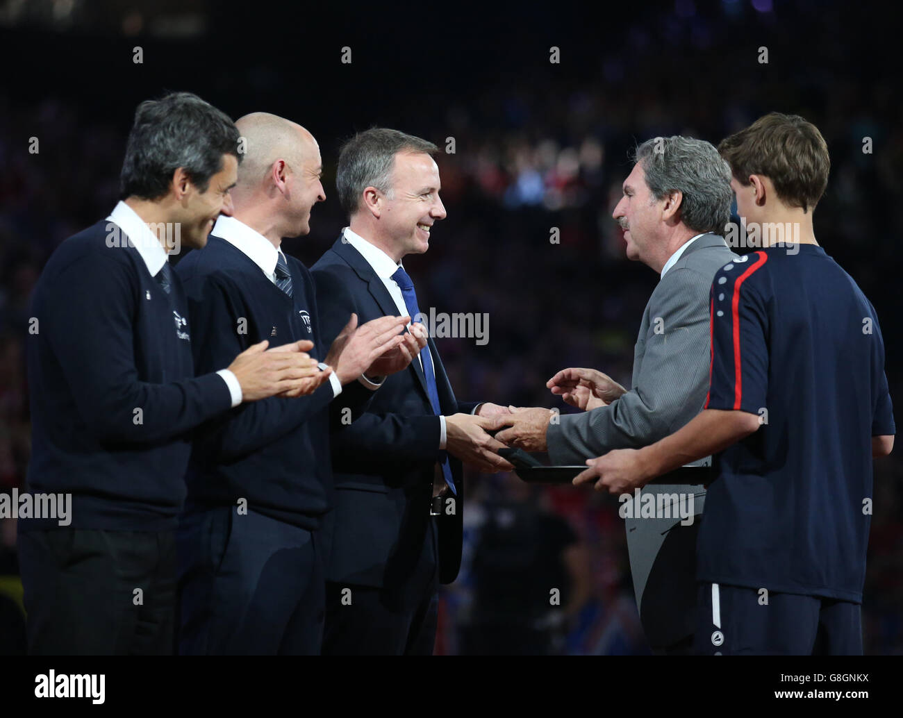 David Haggerty from the ITF presents tournement referee Soren Friemel with a medal after Great Britain won the Davis Cup Final against Belgium during day three of the Davis Cup Final at the Flanders Expo Centre, Ghent. Stock Photo